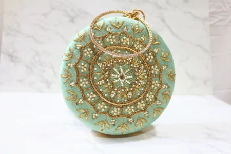 Green Round emroidered clutch with bangle